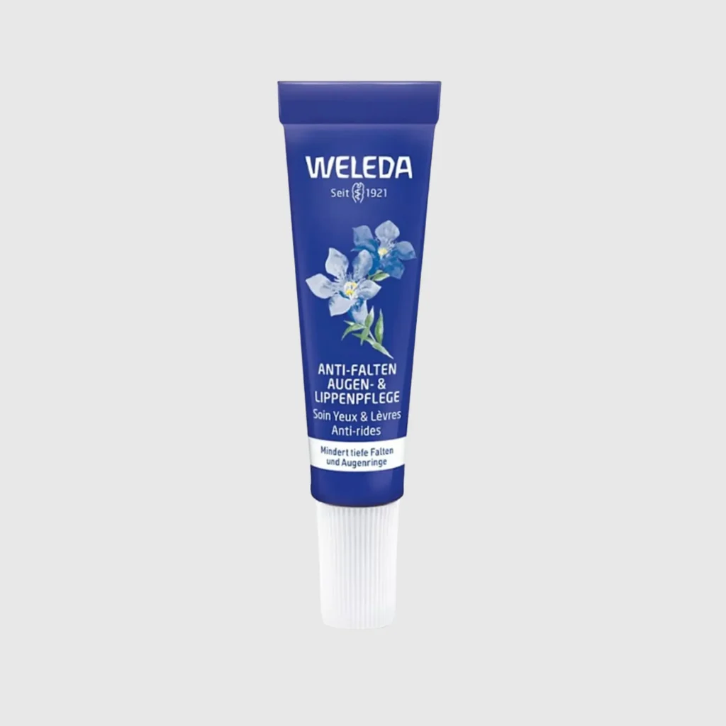 weleda-produkt-anti-falten-augen-und-lippenpflege-tube-blau-grauer-hintergrund